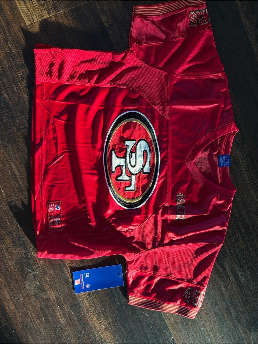 Women’s size medium Red San Francisco 49ers Logo Football Jersey